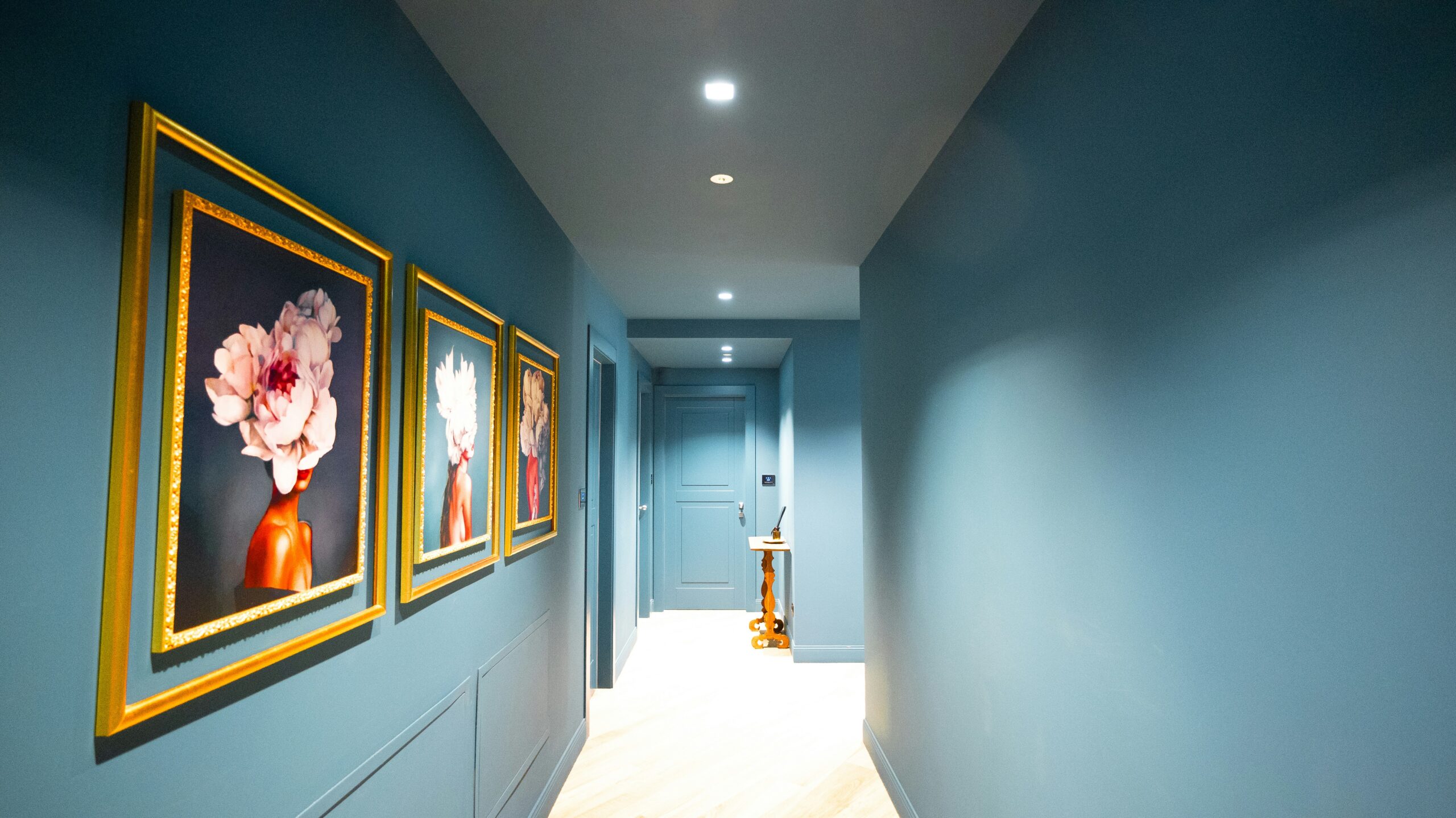 How to Use Picture Lights to Make Your Home Feel Like a Private Gallery